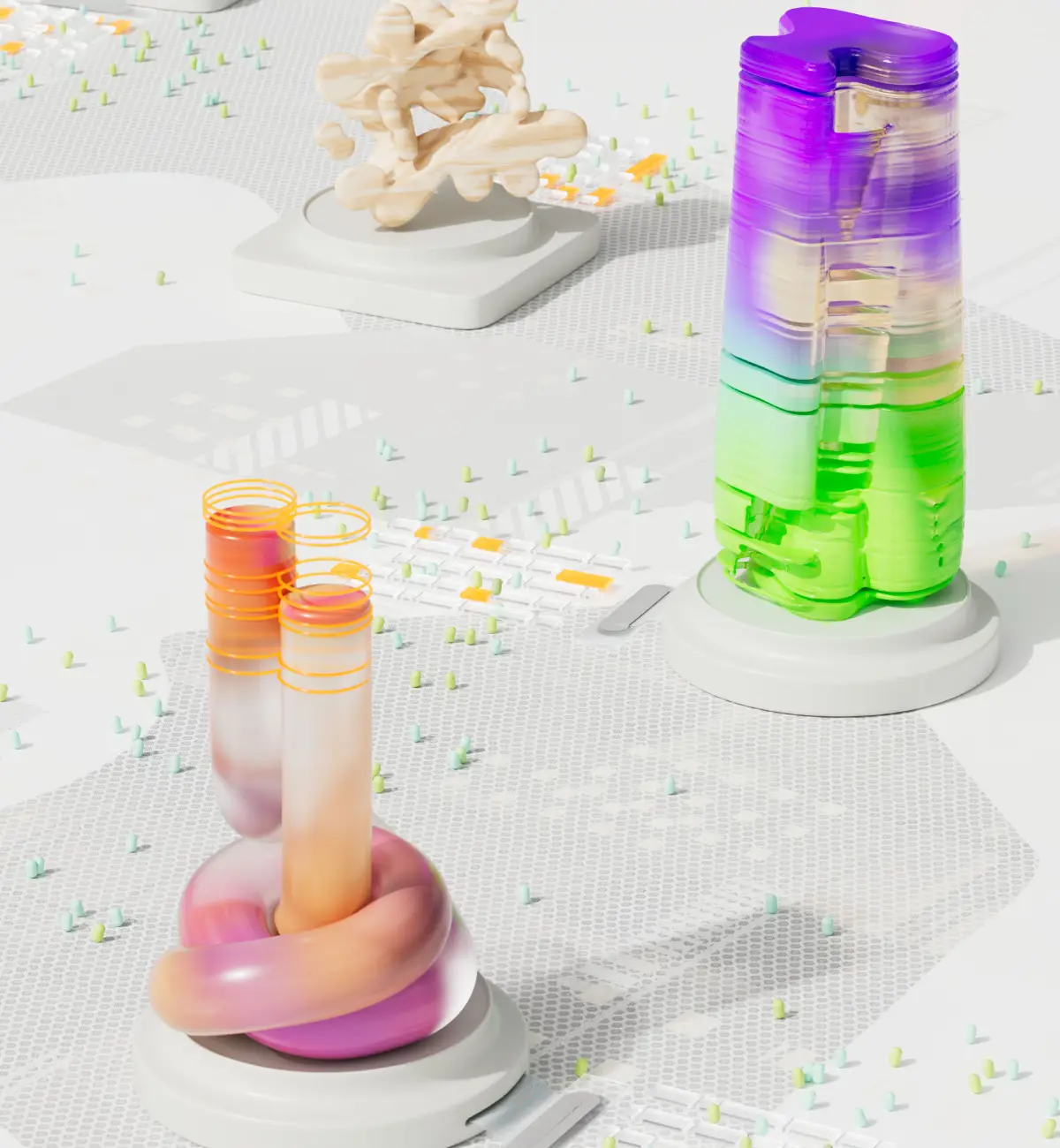 Colourful translucent tubes and rounded abstract sculptures arranged on separate white platforms